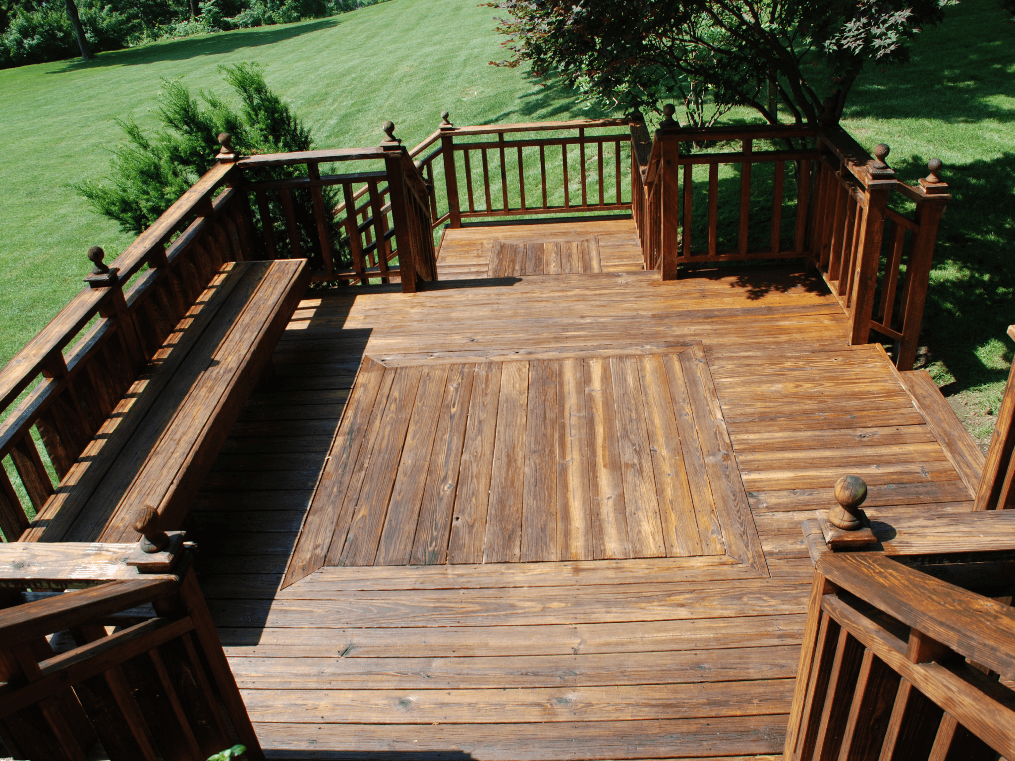 Elevated wooden deck with railing