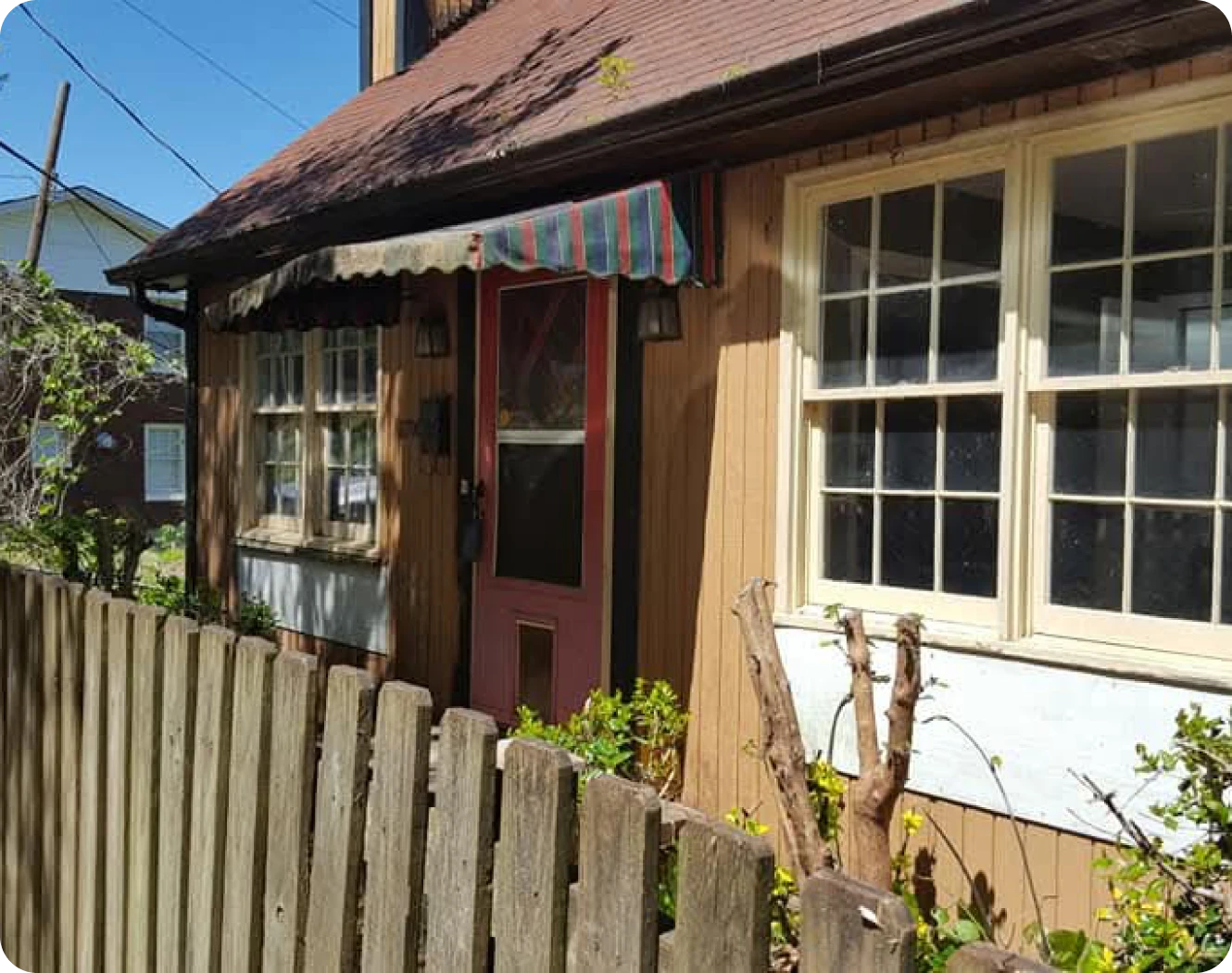 Rustic home with red door