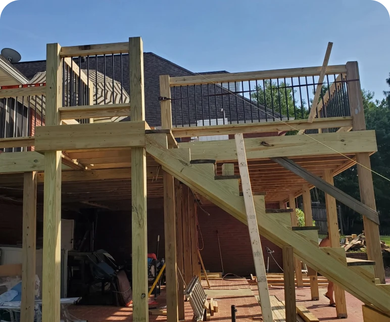 Unfinished wooden deck structure and staircase